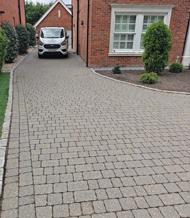 Clean driveway and garden path beside a Hampshire home